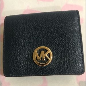 - Michael Kors Wallet
